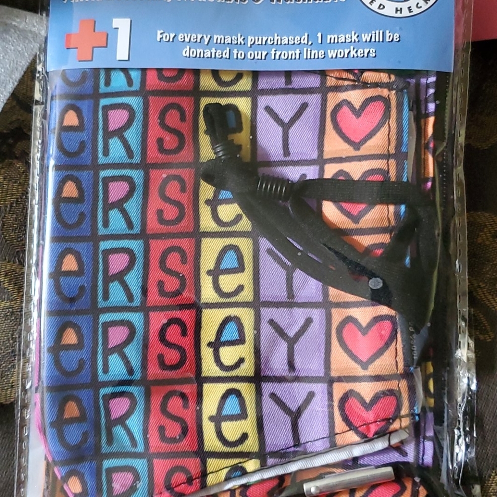 Ed heck designer mask and pouch